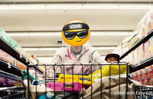 A Person In A Shopping Cart With A Smiley Face On Their Head That Says ' Clipb ' On It GIF