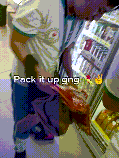 A Person In A Store With The Words Pack It Up Gng On It GIF