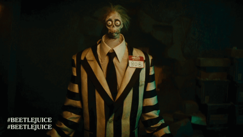 A Person In A Striped Suit Has A Name Tag That Says Hello 808 GIF