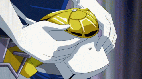 A Person In White Gloves Is Holding A Small Yellow Object GIF