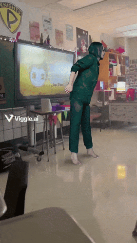 A Person Is Dancing In A Classroom With A Sign That Says Knights GIF