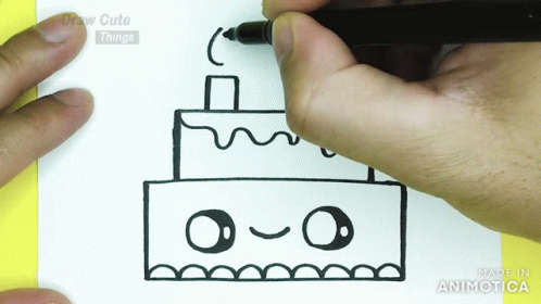 A Person Is Drawing A Cake On A Piece Of Paper With The Words Draw Cute Things Above It GIF