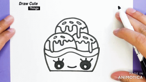 A Person Is Drawing A Cupcake With A Marker On A Piece Of Paper That Says Draw Cute Things On It GIF