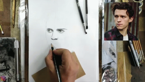 A Person Is Drawing A Picture Of A Man 'S Face GIF