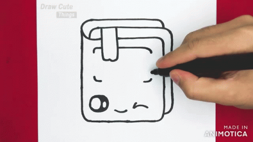 A Person Is Drawing A Towel With A Face On It GIF