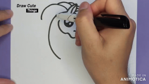 A Person Is Drawing A Unicorn On A Piece Of Paper With The Words Draw Cute Things Above It GIF