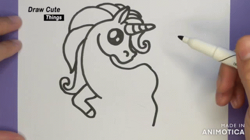 A Person Is Drawing A Unicorn With A Marker GIF
