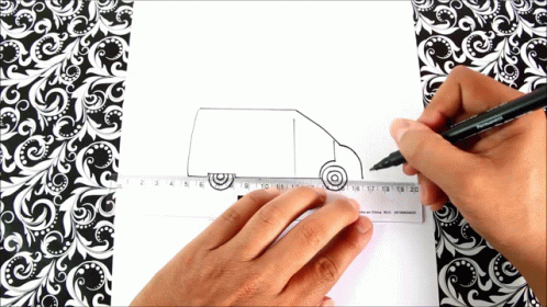 A Person Is Drawing A Van On A Ruler With A Pen GIF
