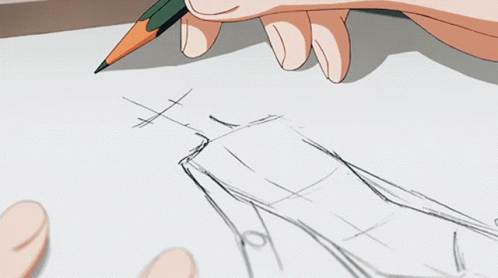 A Person Is Drawing On A Piece Of Paper In Front Of A Book That Says ' Chinese ' On It GIF