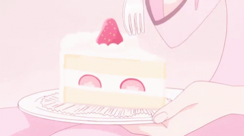 A Person Is Eating A Piece Of Cake With A Fork On A Plate . GIF
