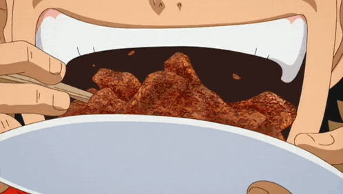 A Person Is Eating Fried Chicken With Chopsticks From A Plate GIF