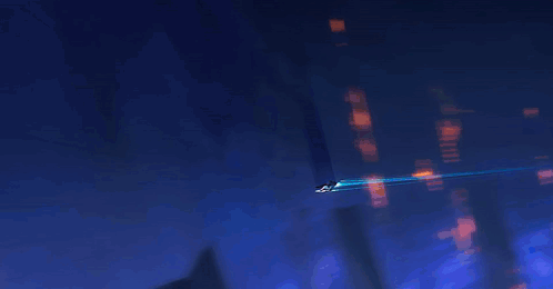 A Person Is Flying Through The Air In A Dark Room GIF