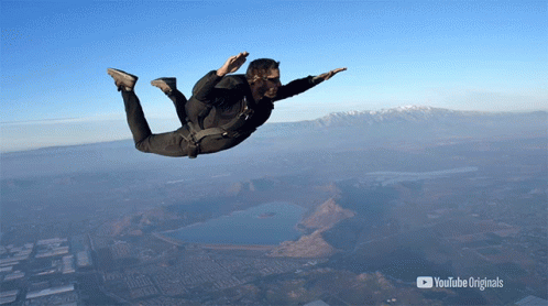 A Person Is Flying Through The Air With A Youtube Originals Logo In The Corner GIF