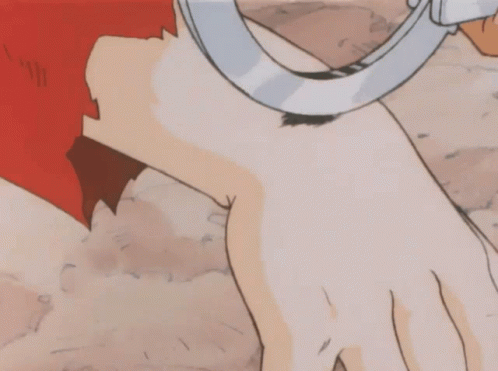 A Person Is Handcuffed To Another Person 'S Hand GIF