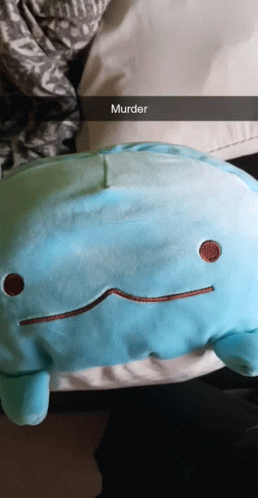 A Person Is Holding A Blue Stuffed Animal That Says Murder On It GIF
