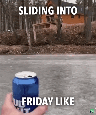 a person is holding a can of budweiser in front of a house