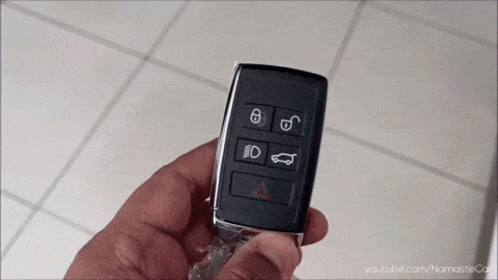 A Person Is Holding A Car Key In Their Hand With A Youtube.com Link Below It GIF
