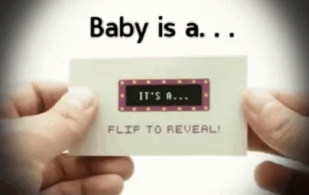 A Person Is Holding A Card That Says ' Baby Is A Flip To Reveal ' GIF