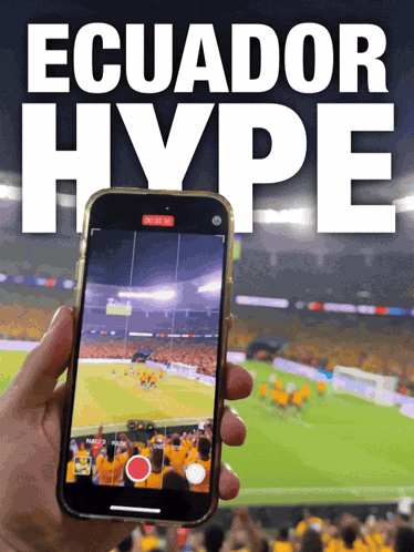 A Person Is Holding A Cell Phone In Front Of An Ecuador Hype Poster GIF