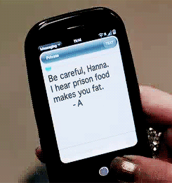 A Person Is Holding A Cell Phone With A Message On It GIF