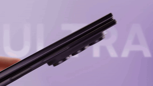 A Person Is Holding A Cell Phone With The Word Ultra Behind Them GIF