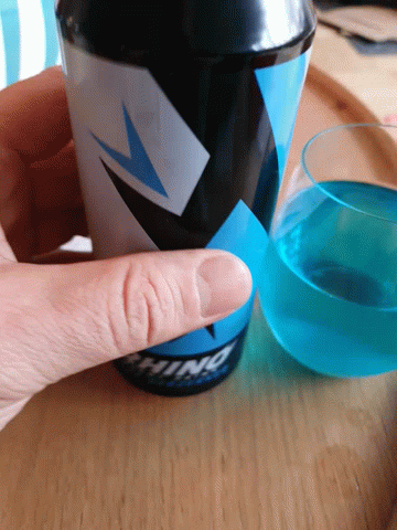 A Person Is Holding A Cup That Says ' Ninja ' On The Side GIF