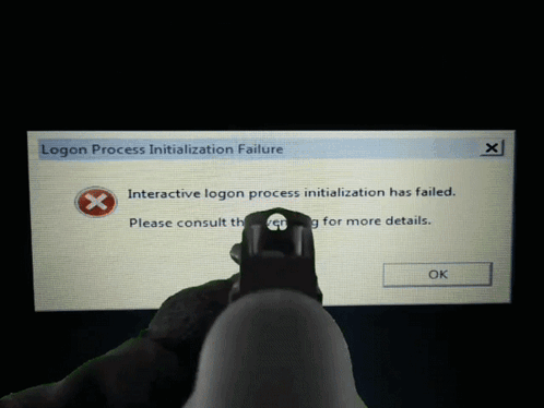 A Person Is Holding A Gun In Front Of A Logon Process Initialization Failure Screen GIF
