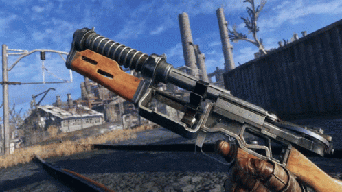 A Person Is Holding A Gun With The Number 8 On The Side GIF