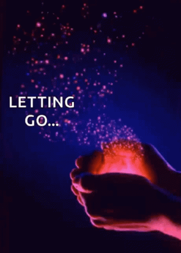 a person is holding a light in their hands with the words letting go written on it