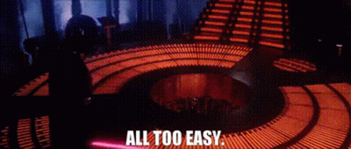 A Person Is Holding A Lightsaber In A Room With The Words `` All Too Easy '' Written On The Bottom . GIF