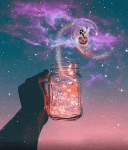 A Person Is Holding A Mason Jar With A Starry Sky Behind It GIF