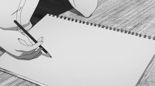 A Person Is Holding A Pencil Over A Piece Of Paper GIF