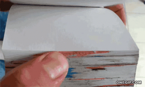 A Person Is Holding A Piece Of Paper In Front Of A Onegif.com Logo GIF