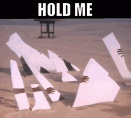 A Person Is Holding A Piece Of Paper That Says Hold Me On It . GIF