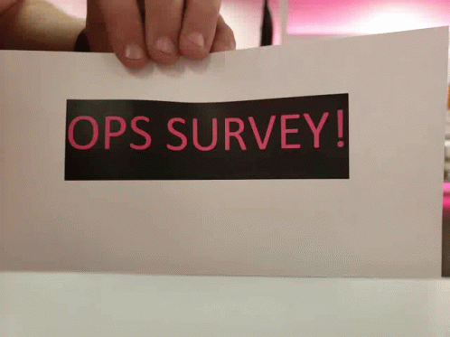 A Person Is Holding A Piece Of Paper With The Words Ops Survey On It GIF