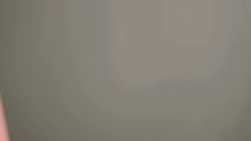 A Person Is Holding A Piece Of Pink Paper That Says Sec GIF