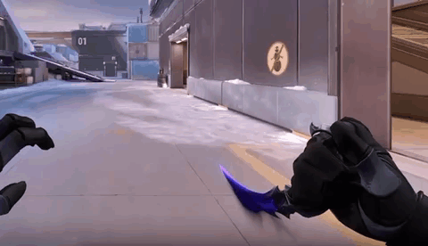 A Person Is Holding A Purple Knife In A Video Game . GIF