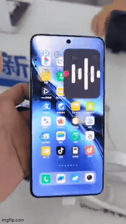 A Person Is Holding A Smart Phone With A Screen That Says Imgflip.com On It GIF