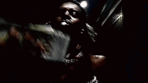 A Person Is Holding A Stack Of 100 Dollar Bills GIF