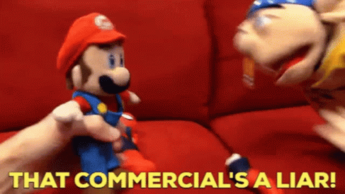 Person Holding Stuffed Mario Doll Says Commercial's A Liar GIF