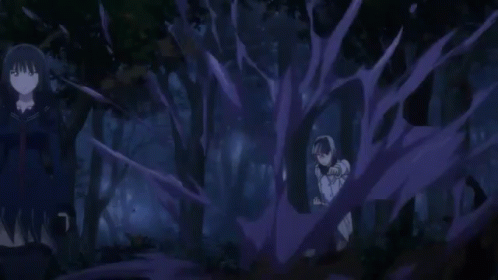 A Person Is Holding A Sword In Their Hand In A Dark Room . GIF
