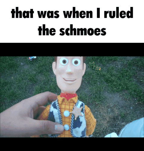 A Person Is Holding A Toy That Says That Was When I Ruled The Schmoes On It GIF