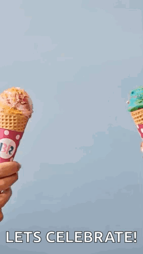A Person Is Holding Two Ice Cream Cones In Their Hands With The Words `` Let 'S Celebrate ! '' GIF