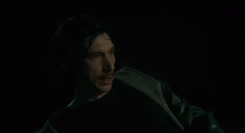 A Person Is Laying In The Water At Night GIF
