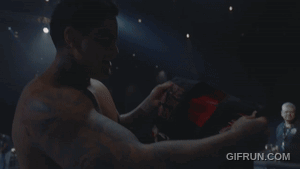A Person Is Laying On A Bed With A Gif Run.com Logo On The Bottom GIF