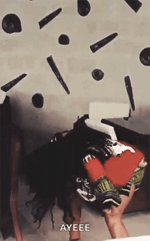 A Person Is Laying On Their Back With A Bunch Of Objects Falling On Them And Says Ayeee . GIF