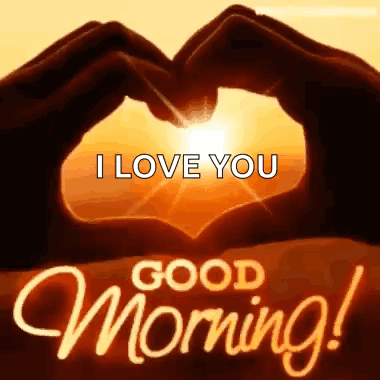 A Person Is Making A Heart Shape With Their Hands In Front Of The Sun With The Words `` I Love You Good Morning '' . GIF
