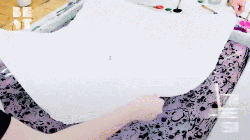 A Person Is Painting On A Piece Of Paper With The Word Be On The Bottom GIF