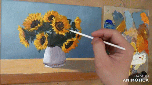 A Person Is Painting Sunflowers In A Vase On A Canvas GIF