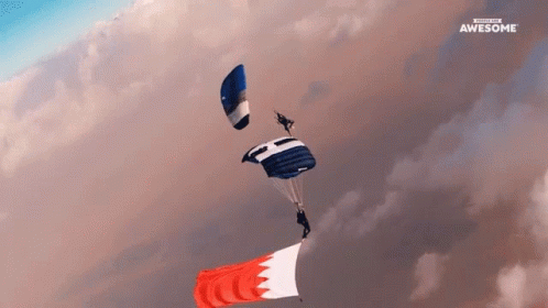 A Person Is Parachuting With A Banner That Says " Awesome " GIF